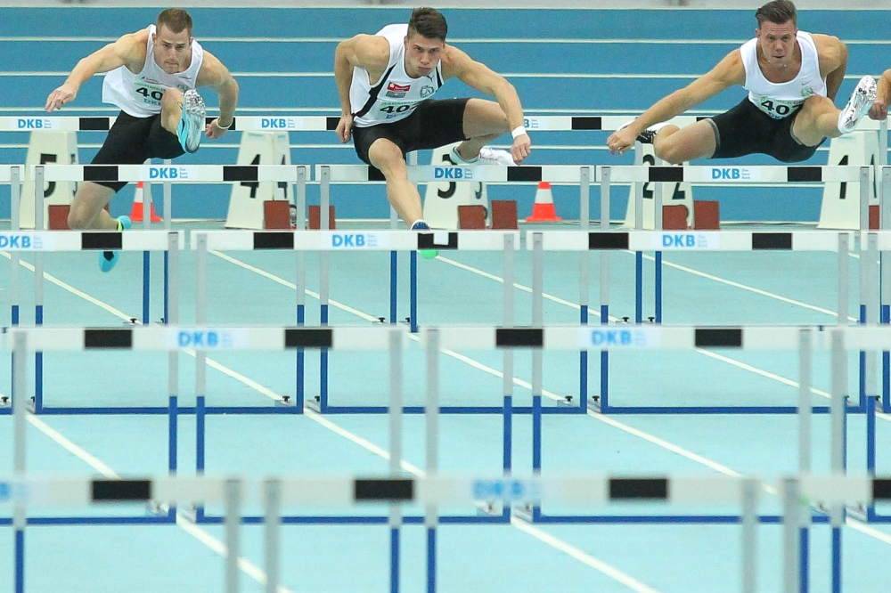 Alle drei Leipziger im Finale über 60m Hürden. Erik Balnuweit (mi.) und Alexander John (re.) sorgten für einen DHfK-Doppelsieg. Foto: Jan Kaefer