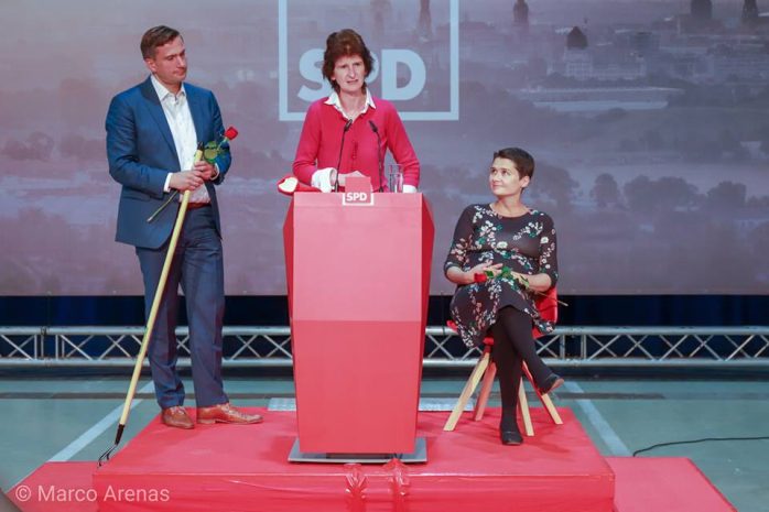 Martin Dulig, Eva-Maria Stange (am Pult) und Daniela Kolbe. Foto: Marco Arenas