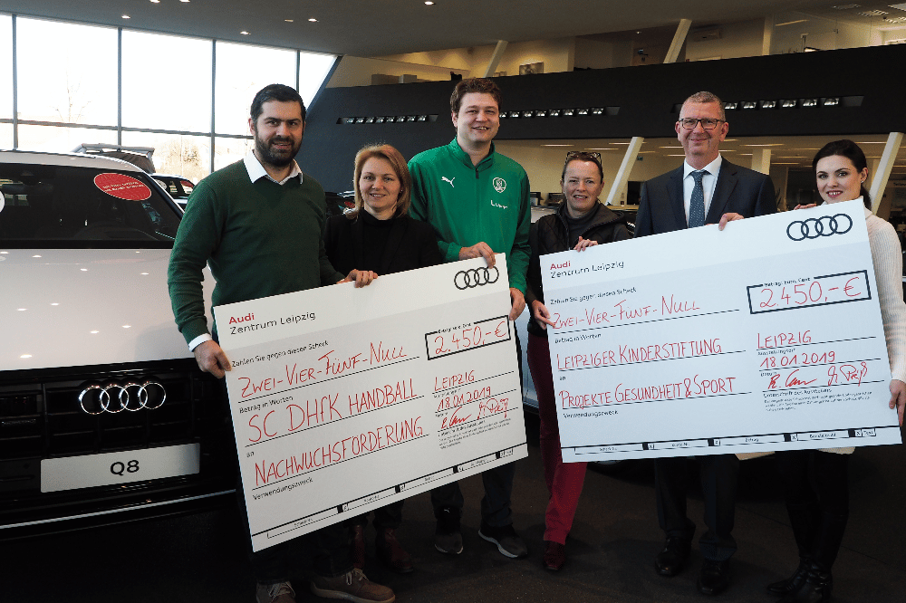 Scheckübergabe. Quelle: SC DHfK Handball Verwaltung GmbH