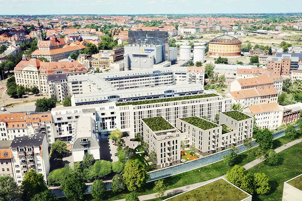 Quartiersübersicht mit dem geplante Radisson Hotel vorn im Bild. Visualisierung: FAY Projects