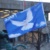 Friedenstaube auf einer blauen Fahne