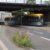 Die Straßenbahn der Linie 16 unter der Eisenbahnüberführung über die Delitzscher Landstraße.