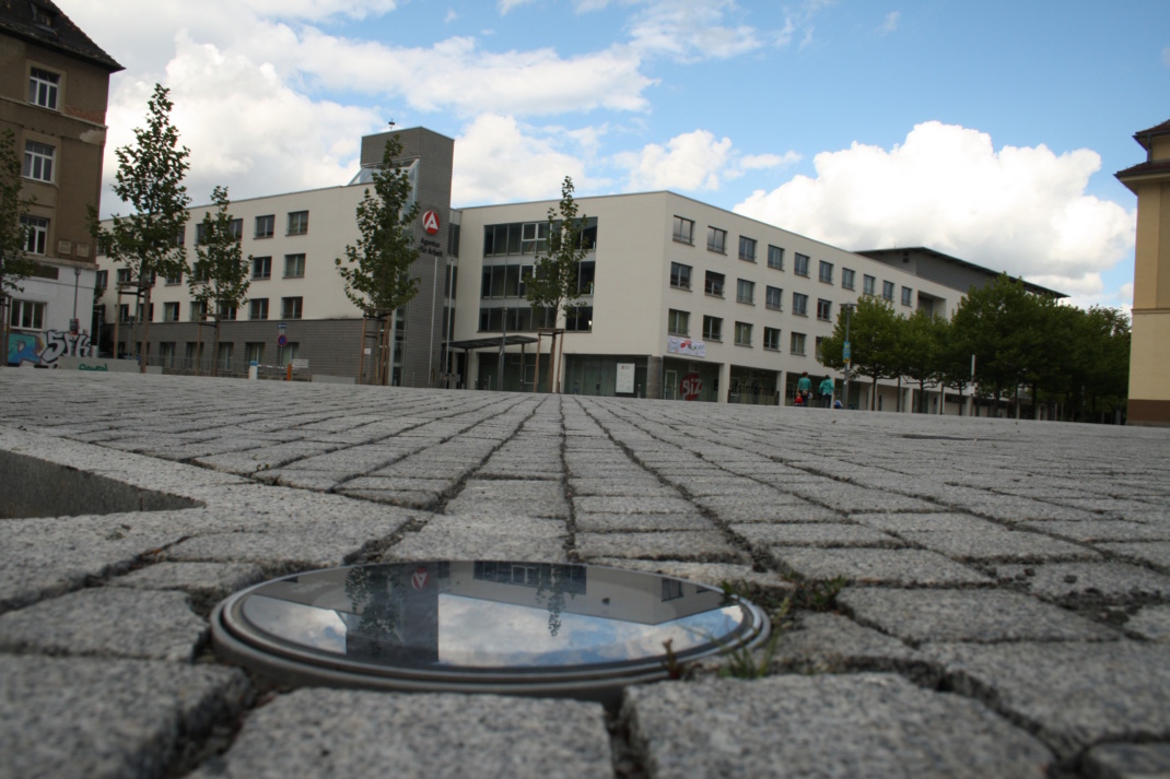 Städtischer Platz, Nahaufnahme des Bodenpflasters.