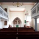 Blick auf Altar und Kanzel. Ghostwriter123, CC BY-SA 4.0, https://commons.wikimedia.org/w/index.php?curid=199686041